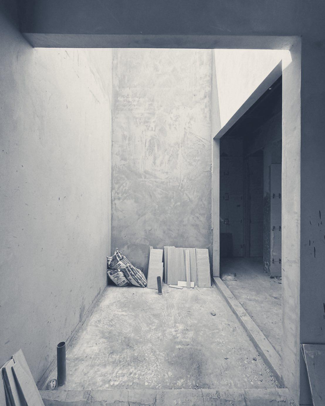 The bathroom as a bare concrete shell, before finishing