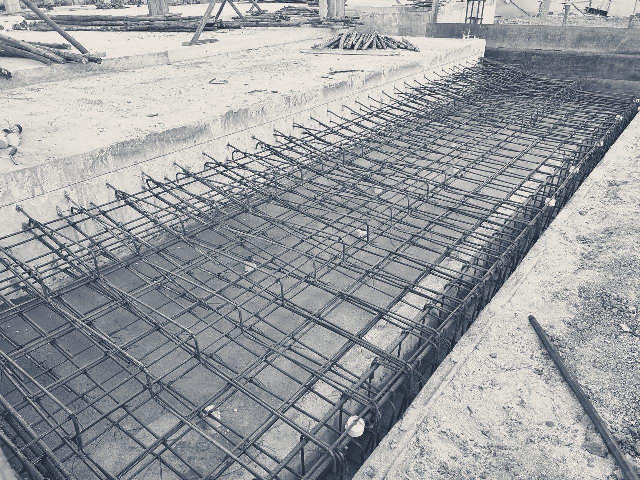 Rebar laid in a long footing trench at the Club House