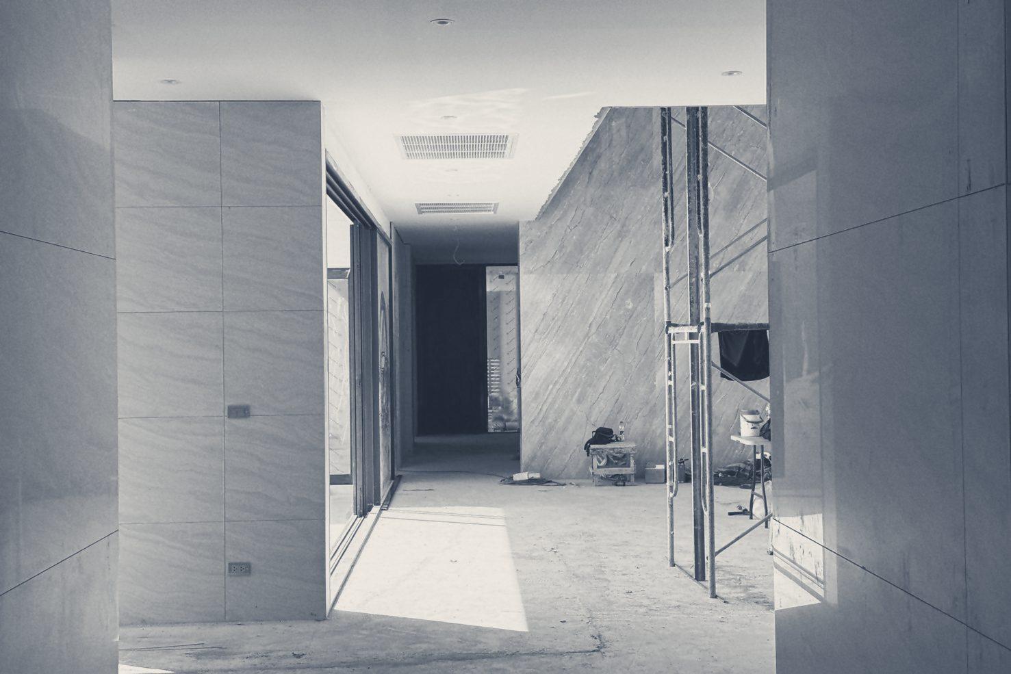 The main hall with its stone-look wall panels on and the floor still to come