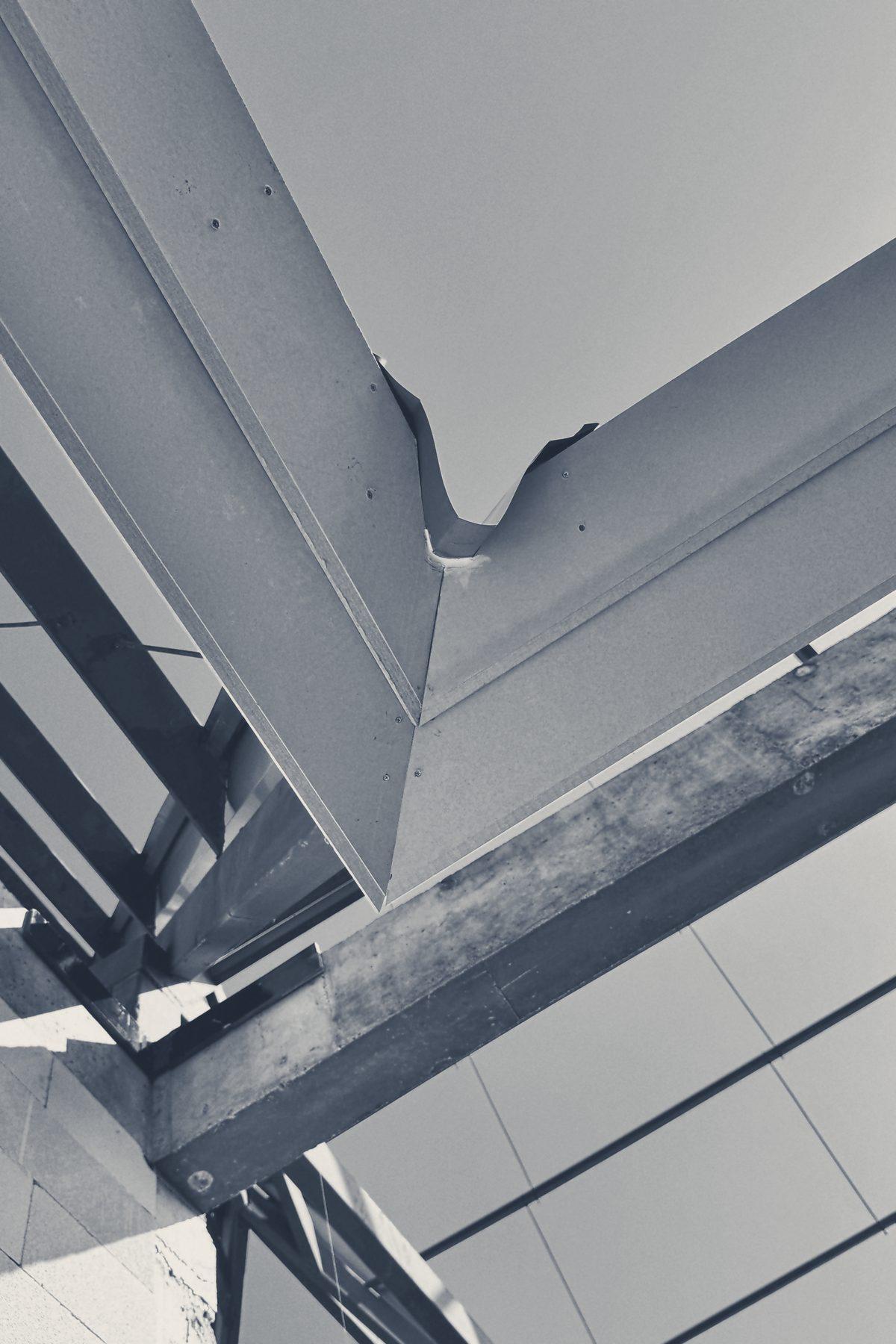 Roof members meeting at the ridge of a Club House gable, seen from below