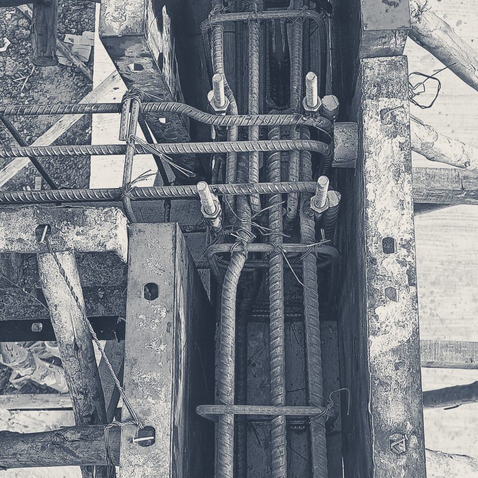 A column rebar cage clamped inside its formwork, close up